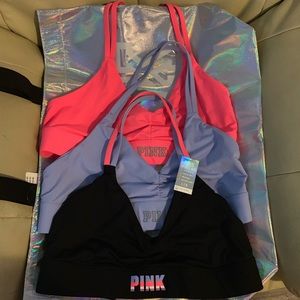 3- Large- Halter VS Pink sports bras.